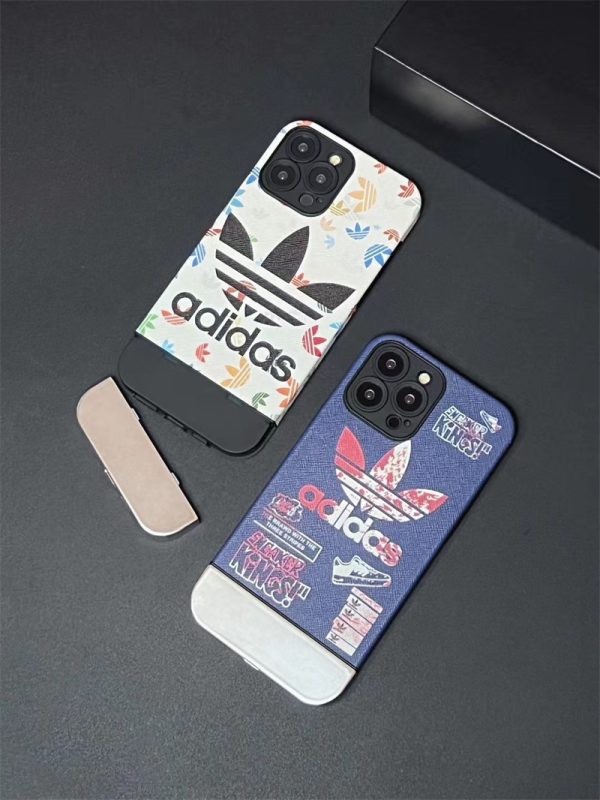 adidas パロディ iphone15/15pro ケース アディダス iphone14pro max/13pro カバー カップル ブランド iphone12/12プロ ケース おしゃれ かわいい