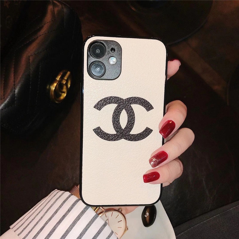 モバイルケース/カバーCHANEL(シャネル) 携帯電話ケース美品  白