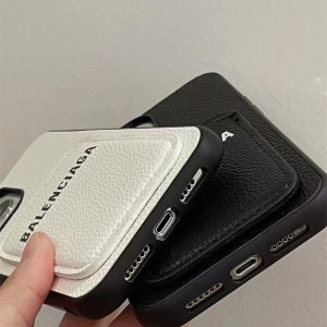 iphone17/17proケース ペア バレンシアガ スマホケース iphone16/15 海外 セレブ 愛用 iphone14pro max ケース BALENCIAGA 携帯カバー 人気 アイフォンケース カード収納